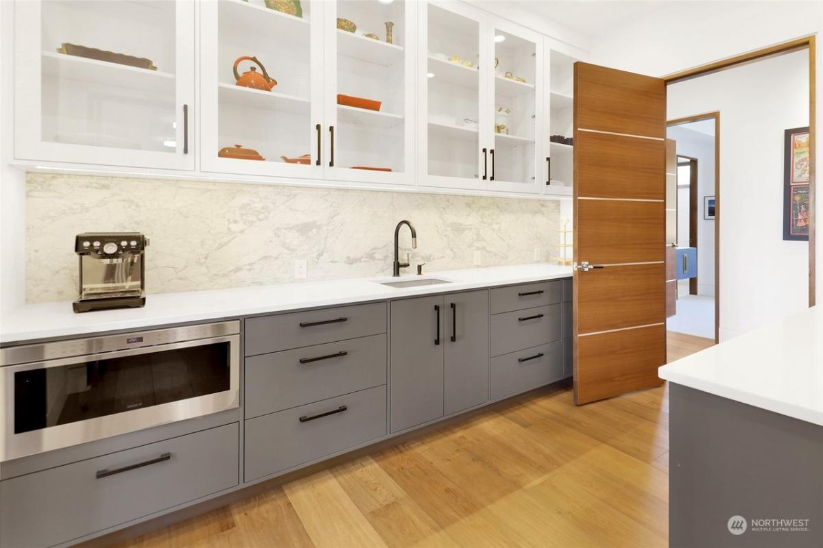 Pantry with custom cabinetry.
