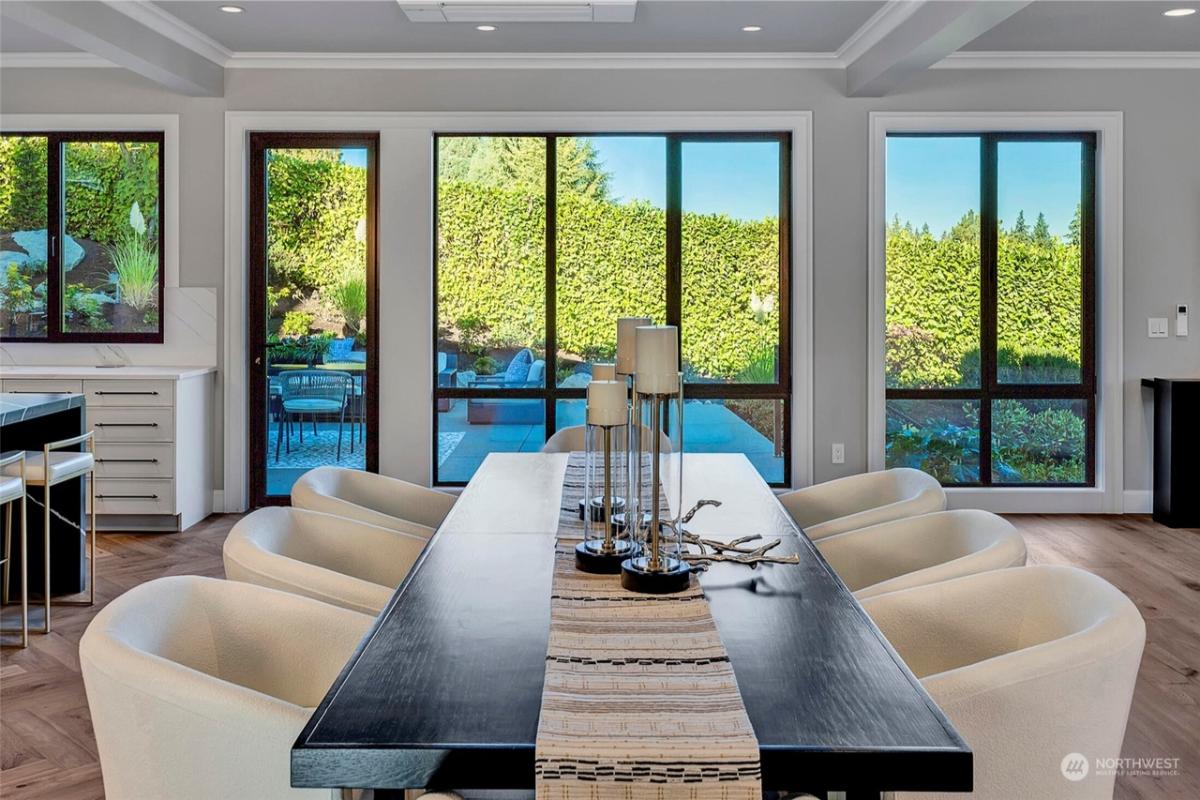 Dining room with a large table and chairs.
