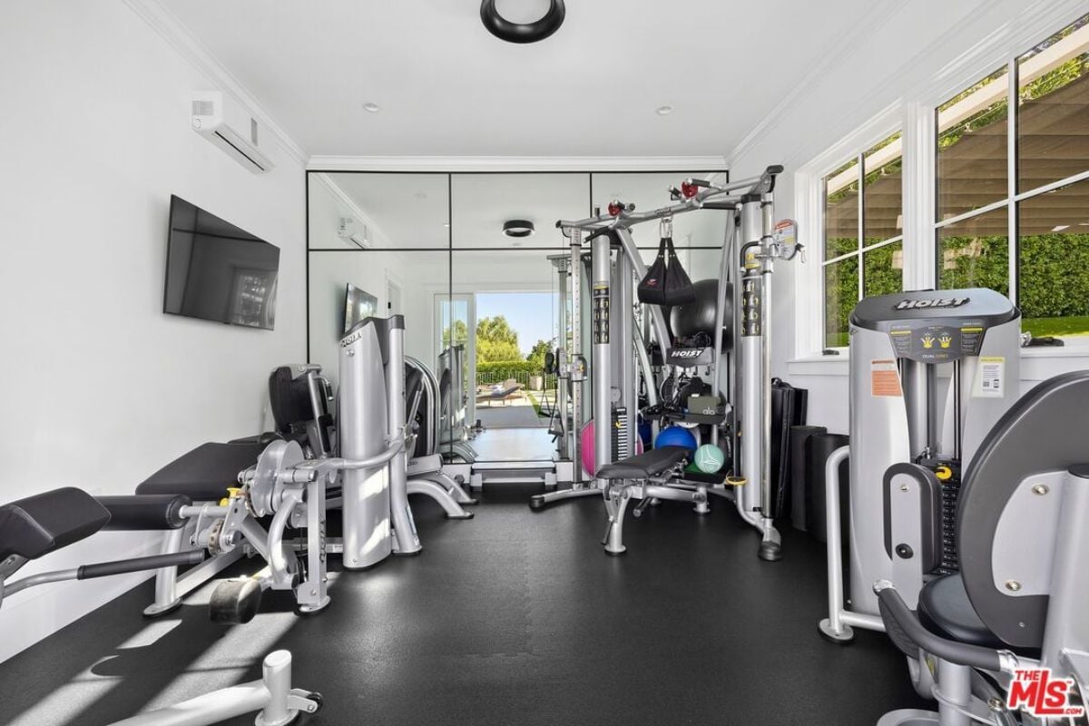 A home gym with gym equipment.