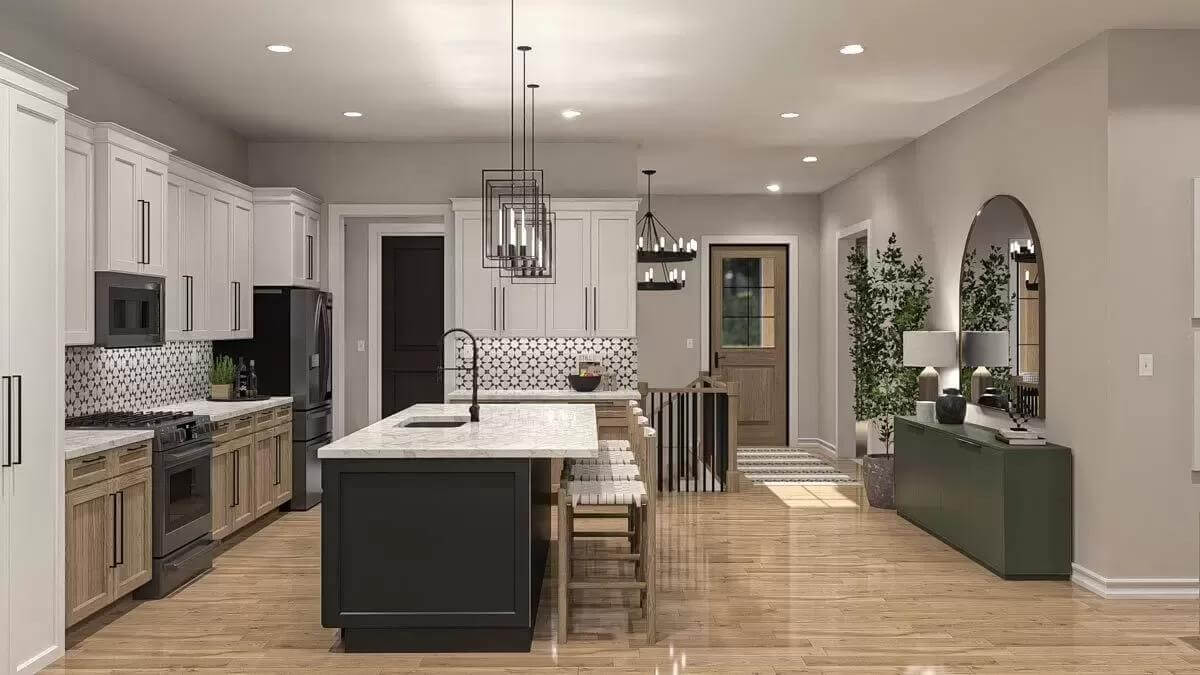 Recessed ceiling lights along with wrought iron pendants suspended over the island illuminate the kitchen.