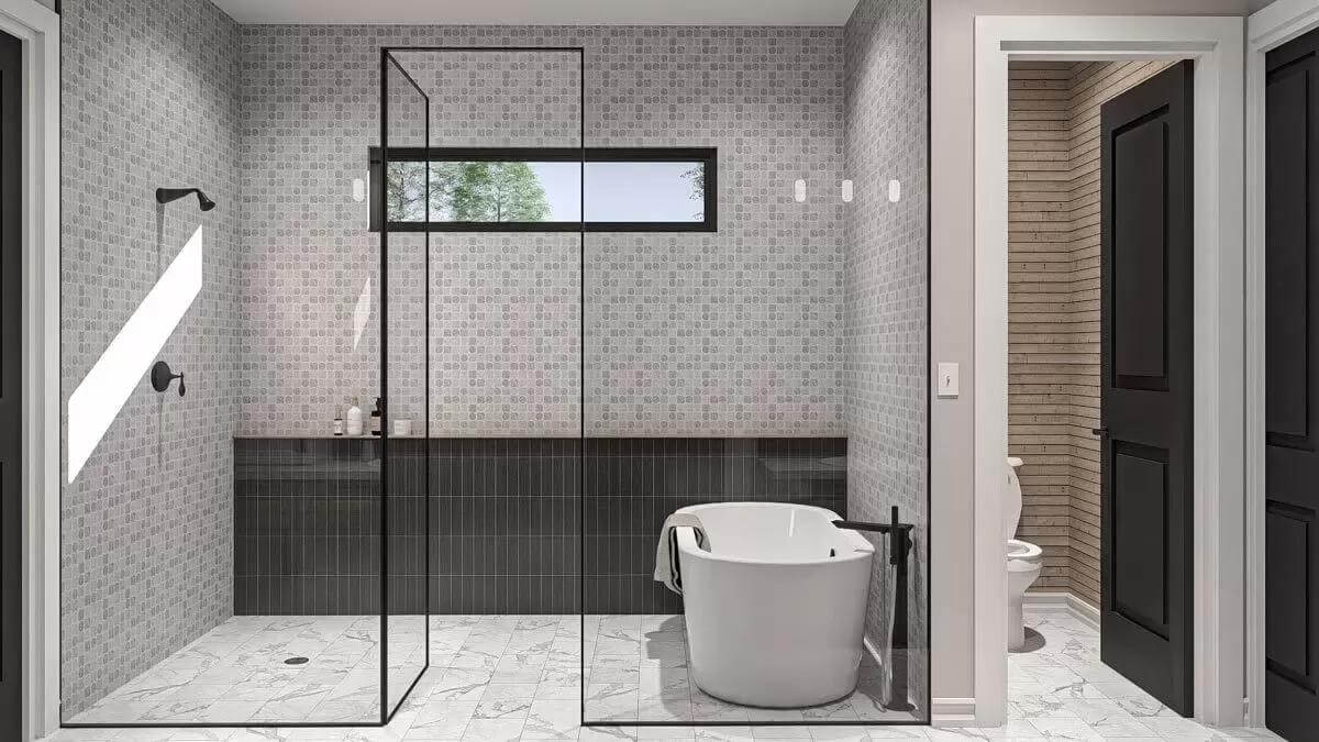 Primary bathroom with a walk-in shower and a soaking tub brightened by a clerestory window.