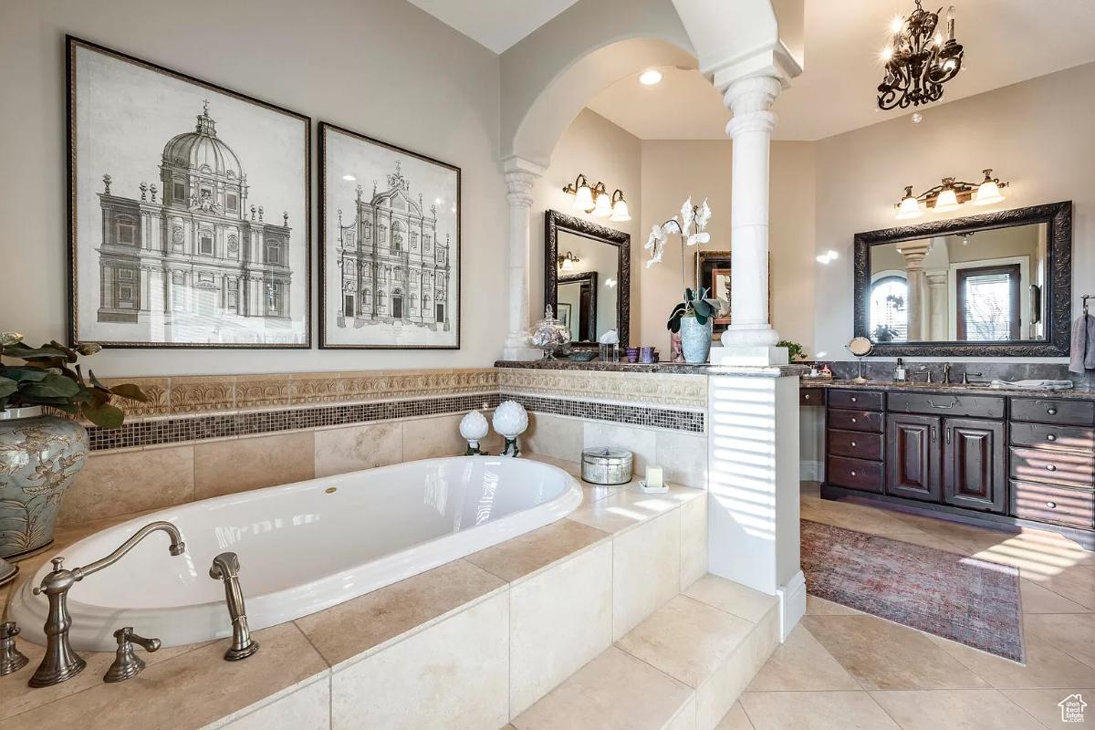 Bathroom with a custom-made vanity and a soaking tub.