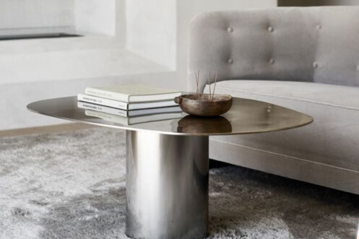 A living room with a couch and a coffee table.