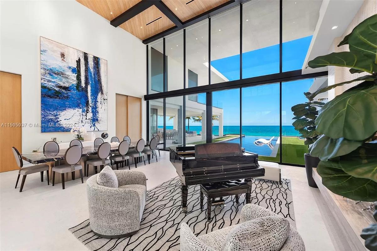 Piano room with couches.