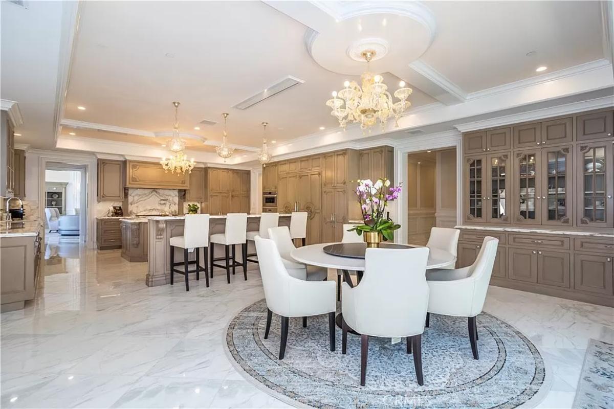 Breakfast nook with a chandelier.