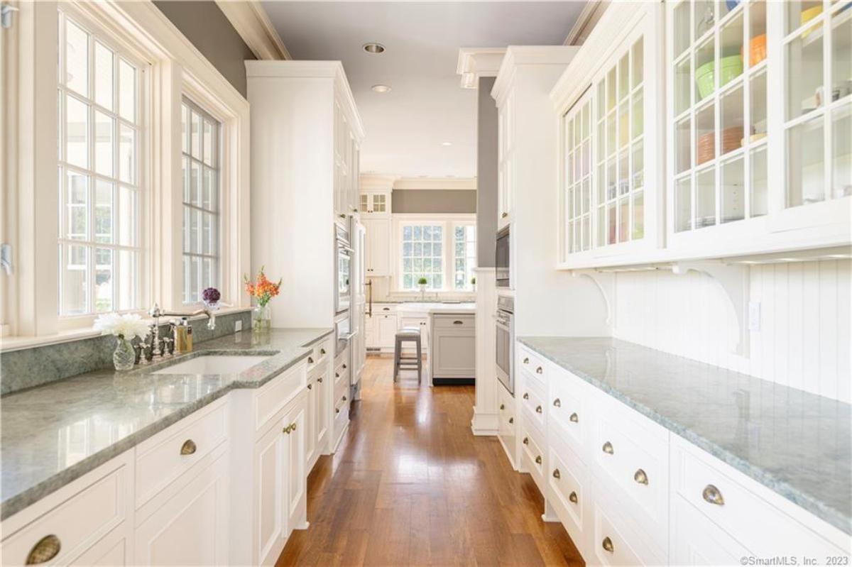 Pantry with custom cabinetry.