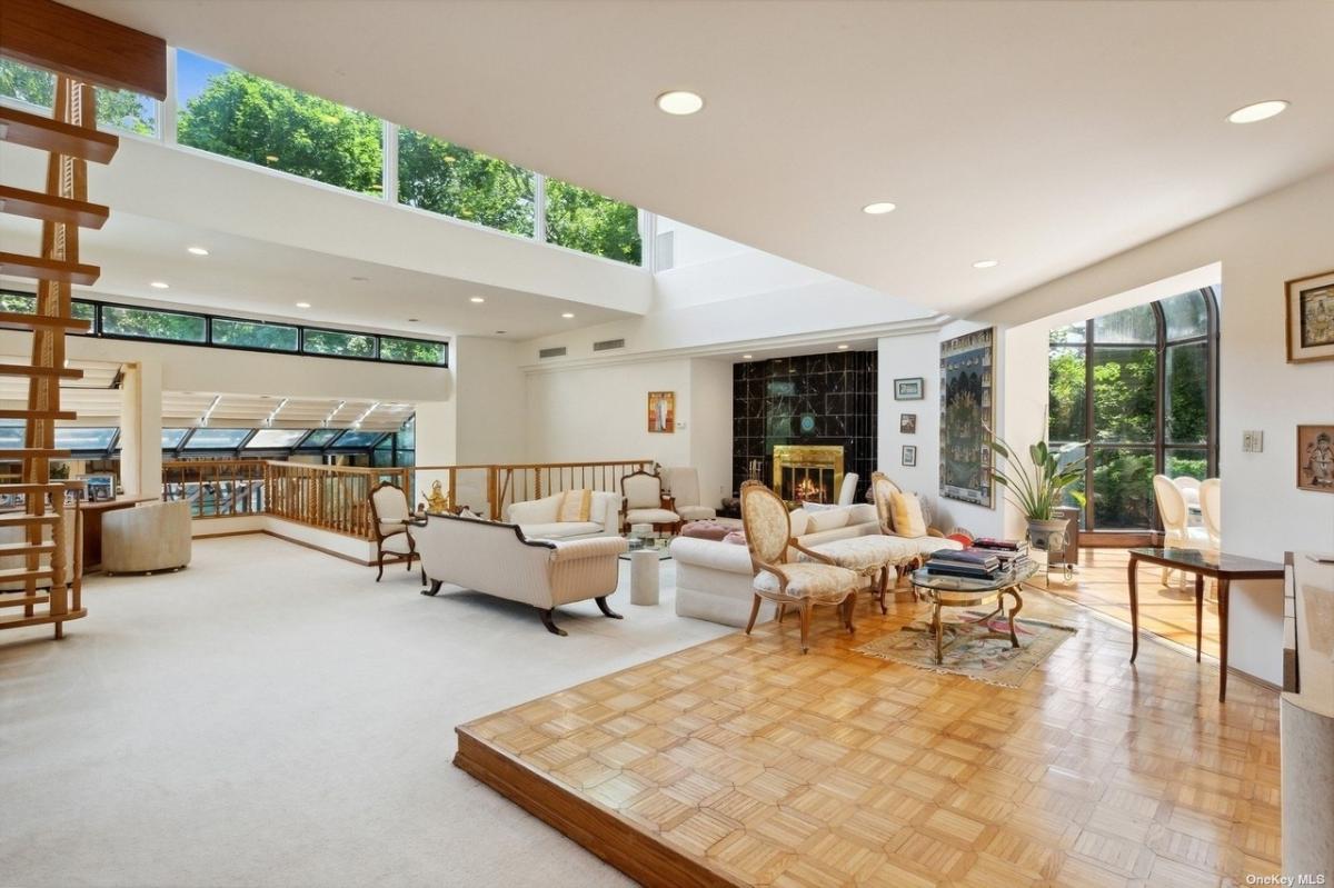Living room with tables and couches.