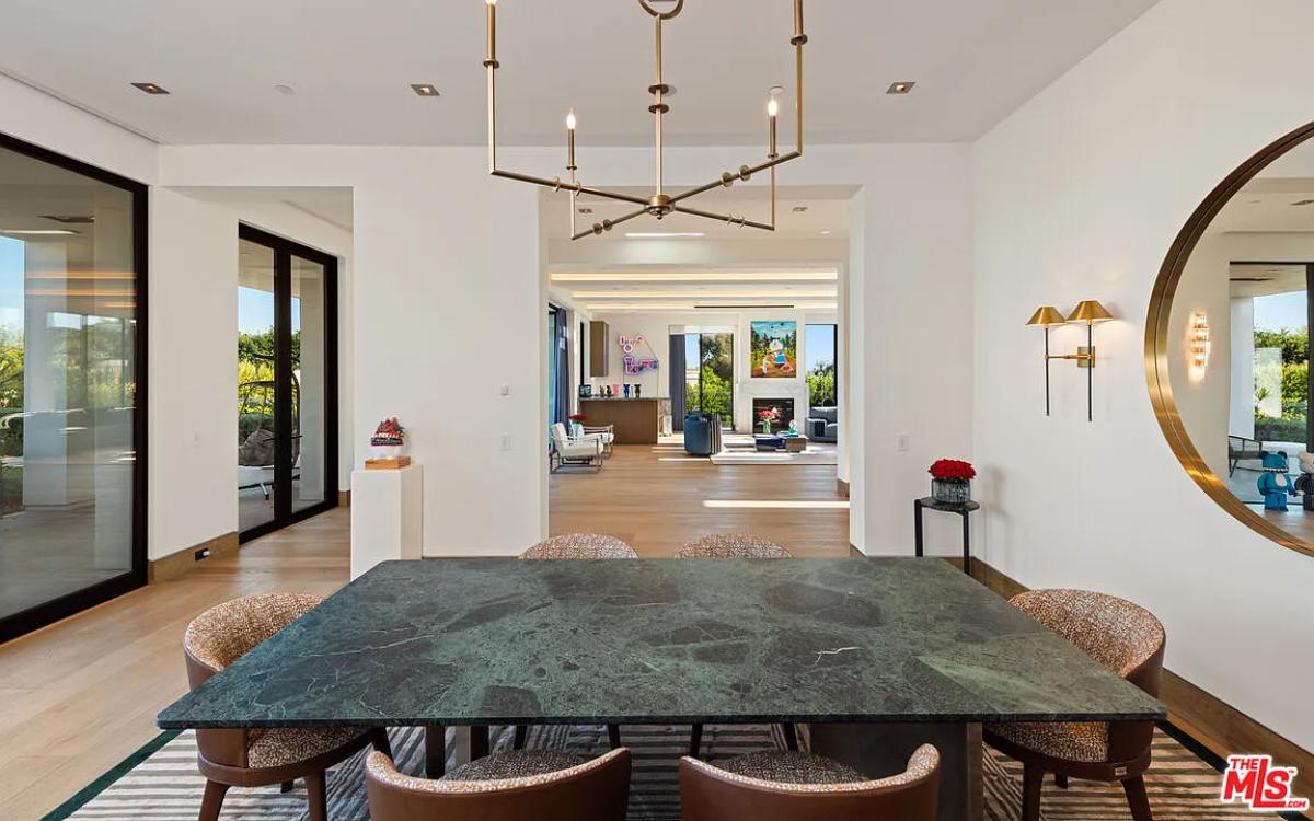 Dining room with a large table.