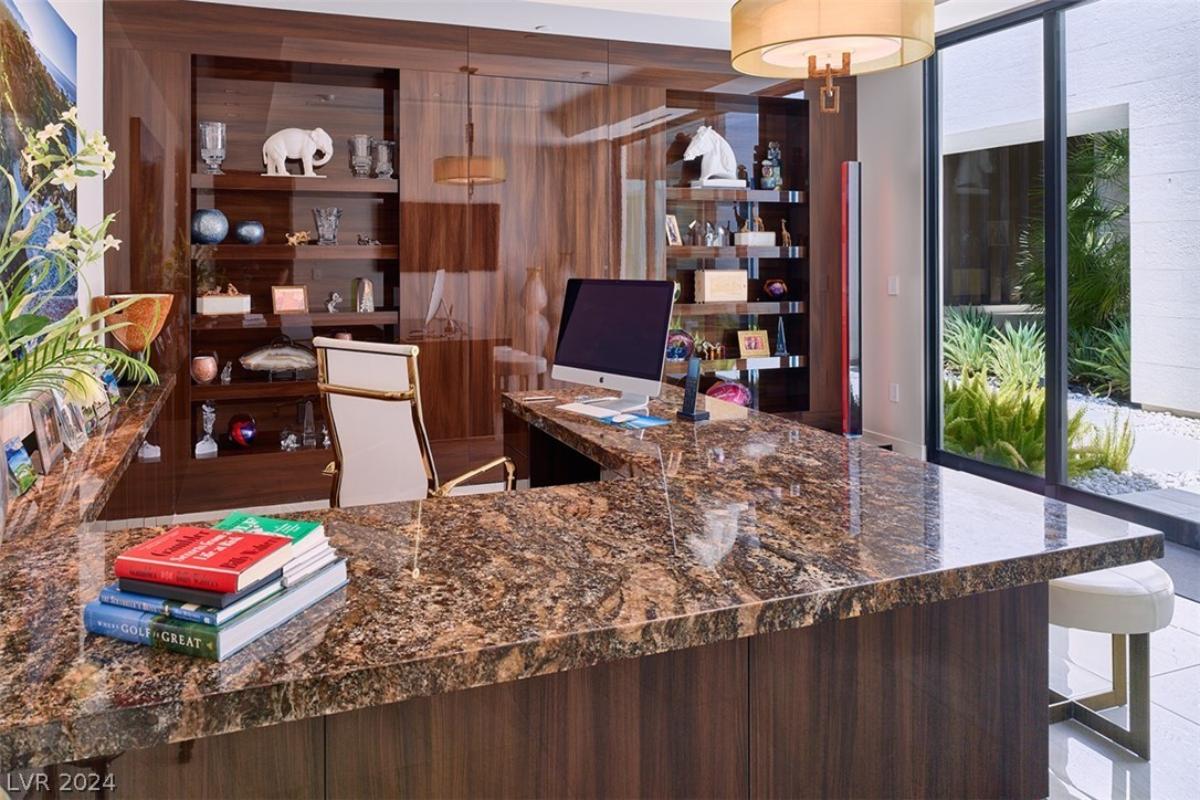 Home office with granite counters.