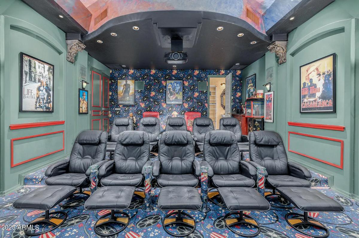Home theater with reclining chairs.