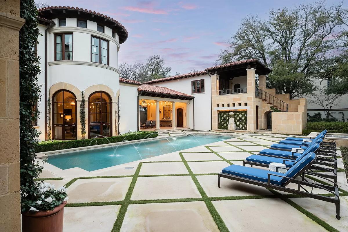 Pool with lounge chairs.
