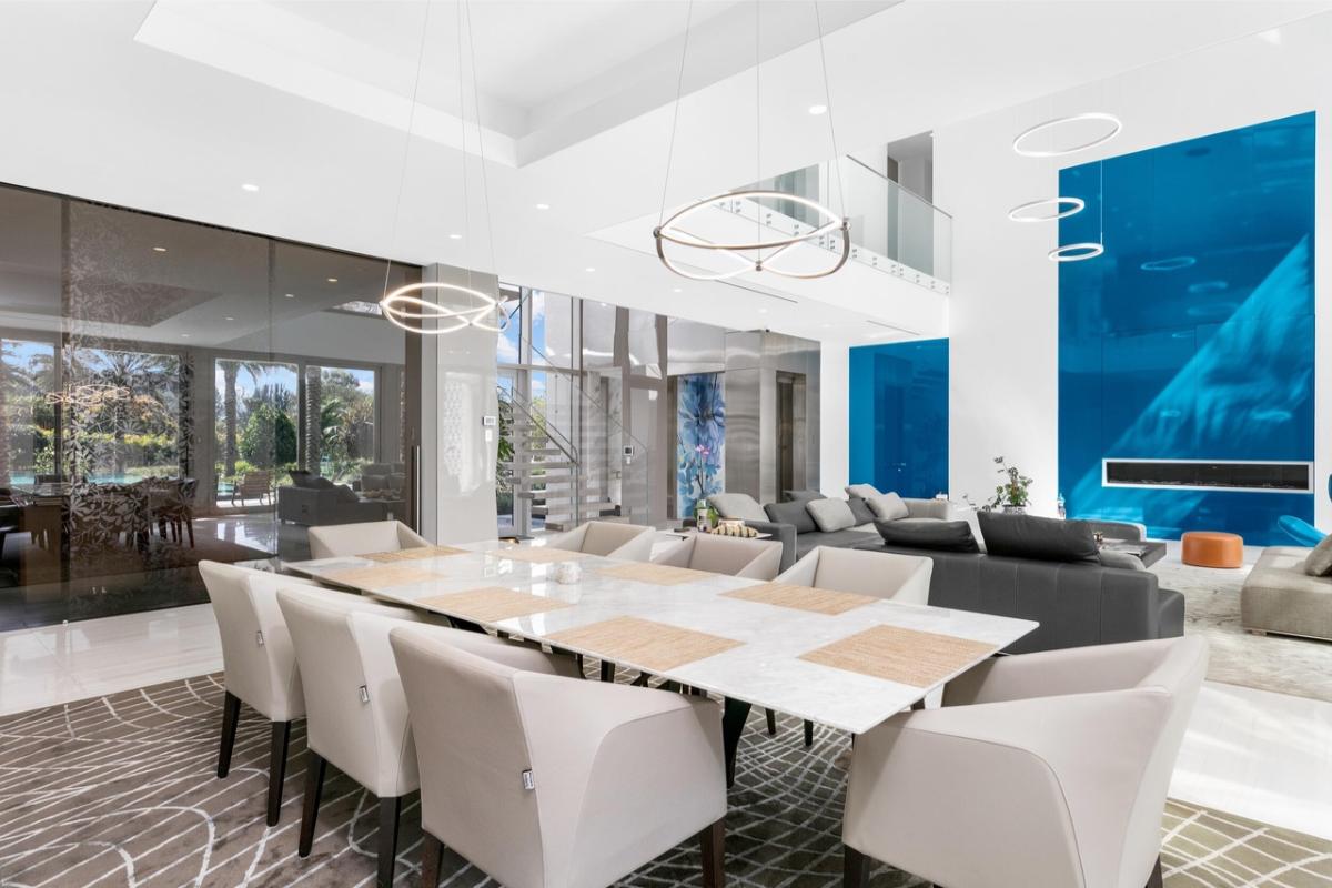 Dining room with a large table and chairs.