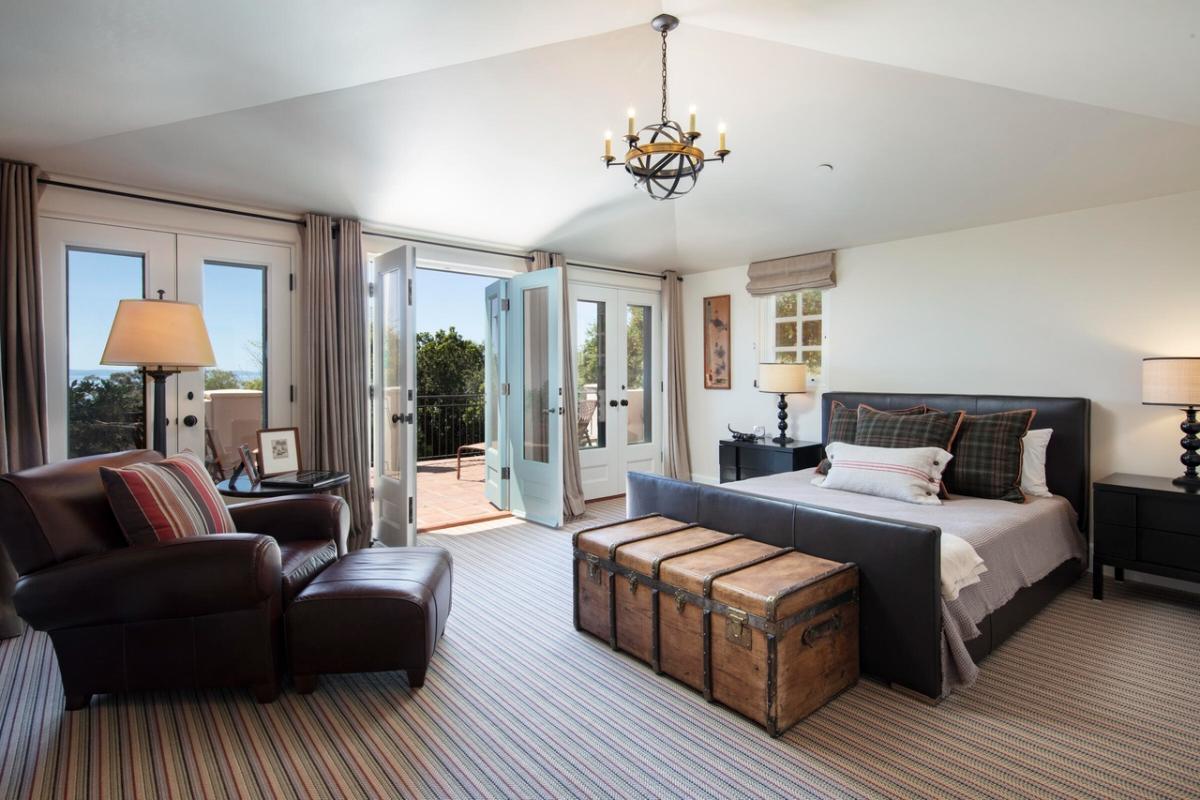 Bedroom with a balcony.
