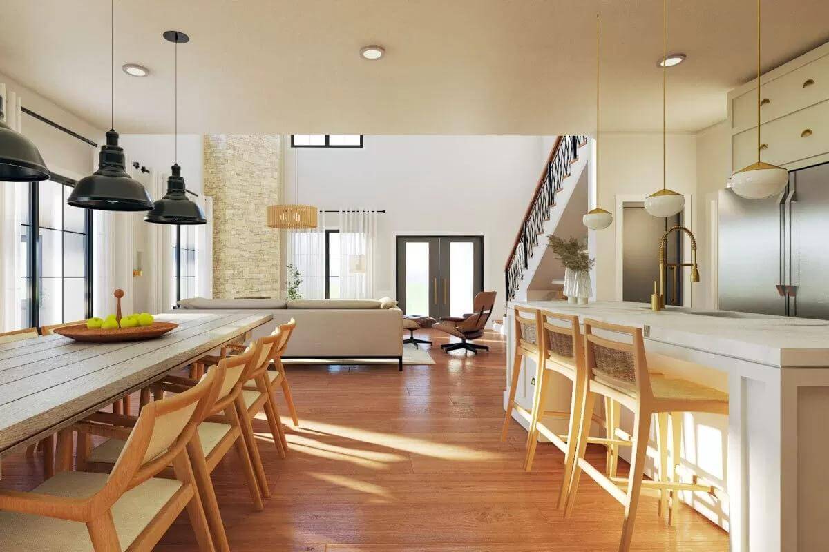 View of the living room from the kitchen and dining area.