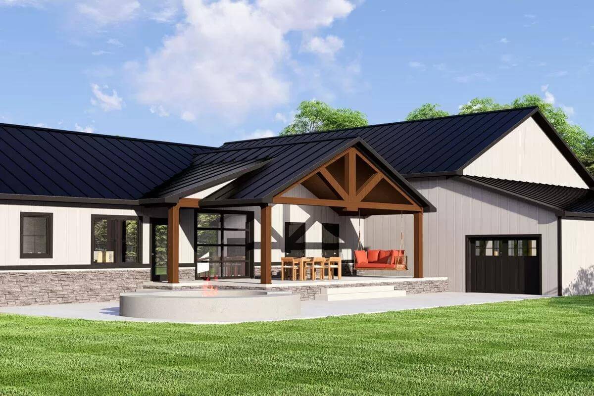 Covered patio highlighted by an exposed truss and timber pillars.