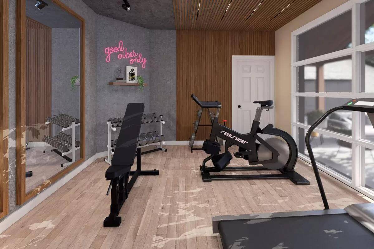 Gym with large windows and a paneled ceiling.