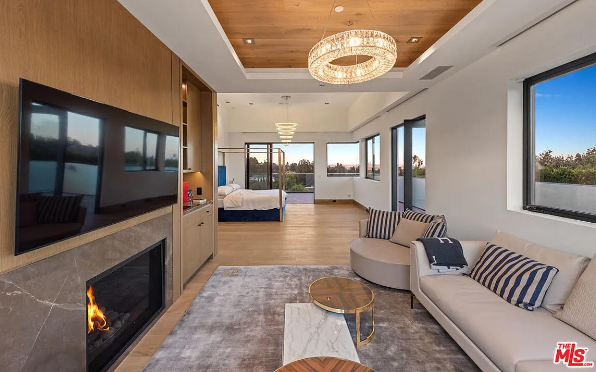 Bedroom with a private living space.