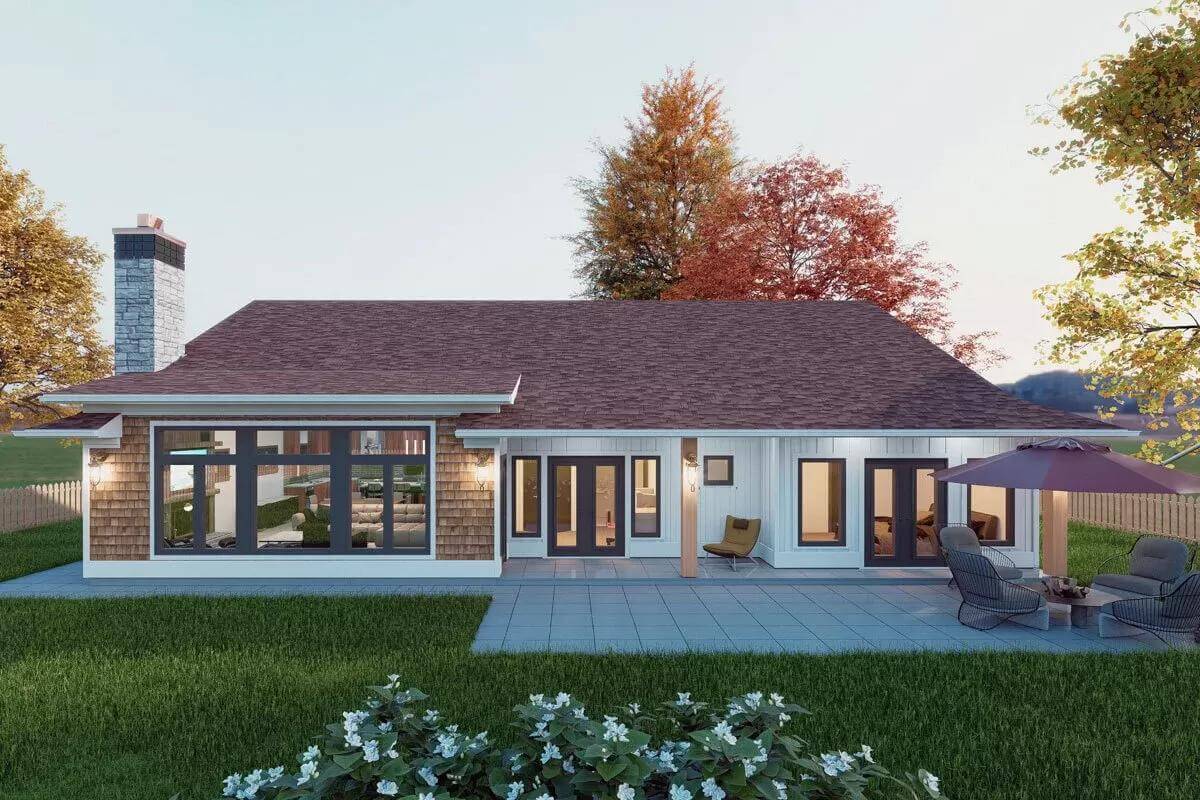 Rear view with a covered porch and a concrete patio.