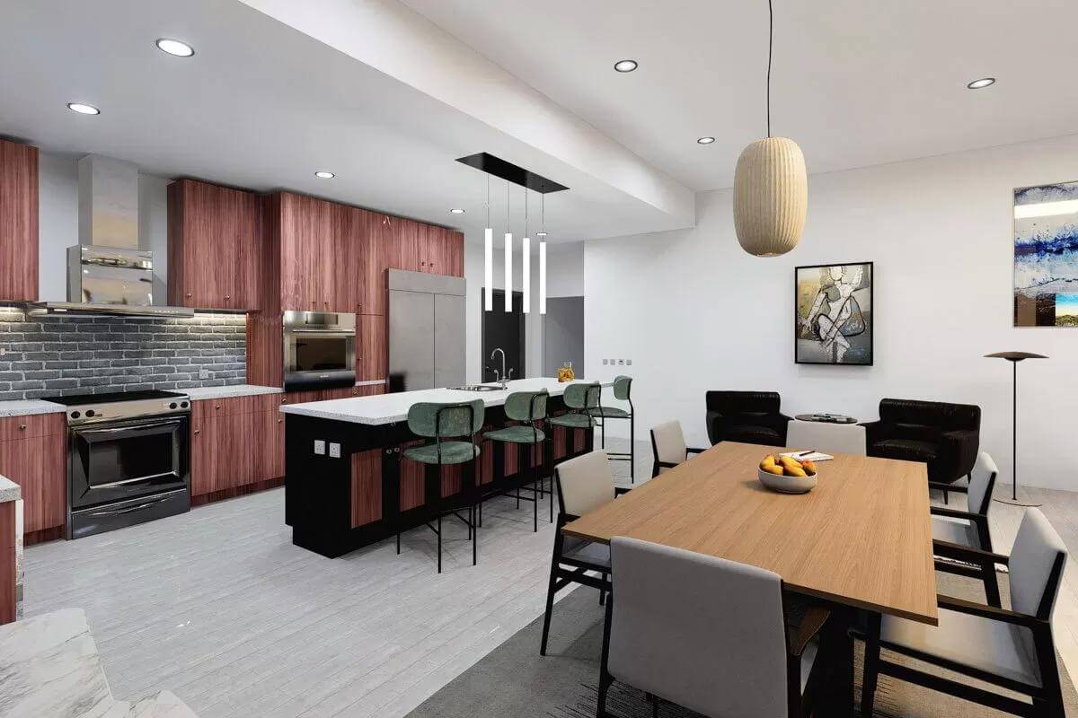 Dining area and kitchen with redwood cabinets, slate appliances, a breakfast bar, and a wooden dining set.