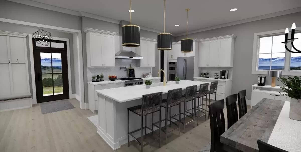 Kitchen with white cabinetry and a matching island topped by drum pendants.