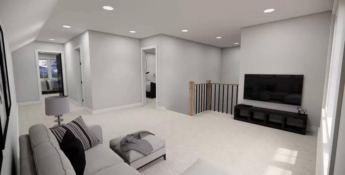 Loft with a wall-mounted TV and a sectional sofa over the carpeted floor.