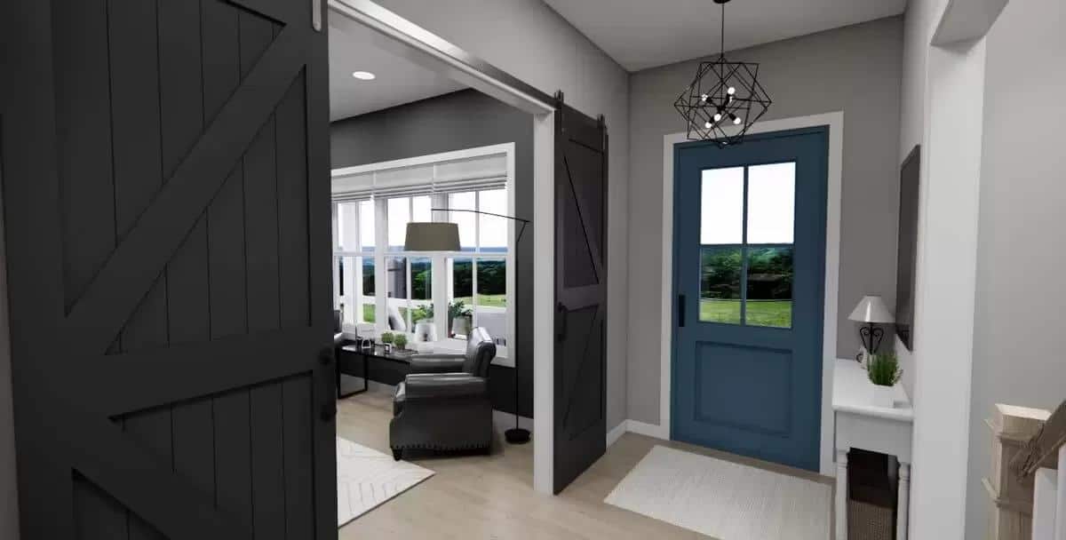 Rear entry with a glazed door and a geometric pendant.
