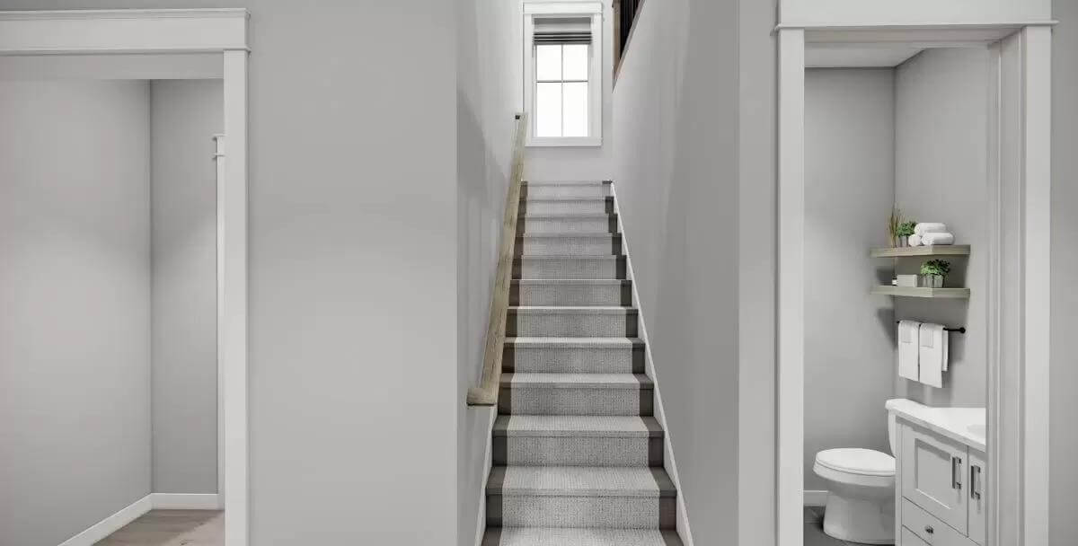 Staircase leading to the secondary bedrooms.