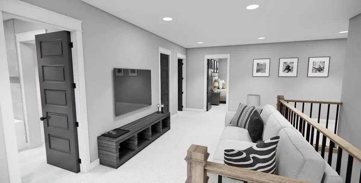 Loft with a sectional sofa and a wall-mounted TV.