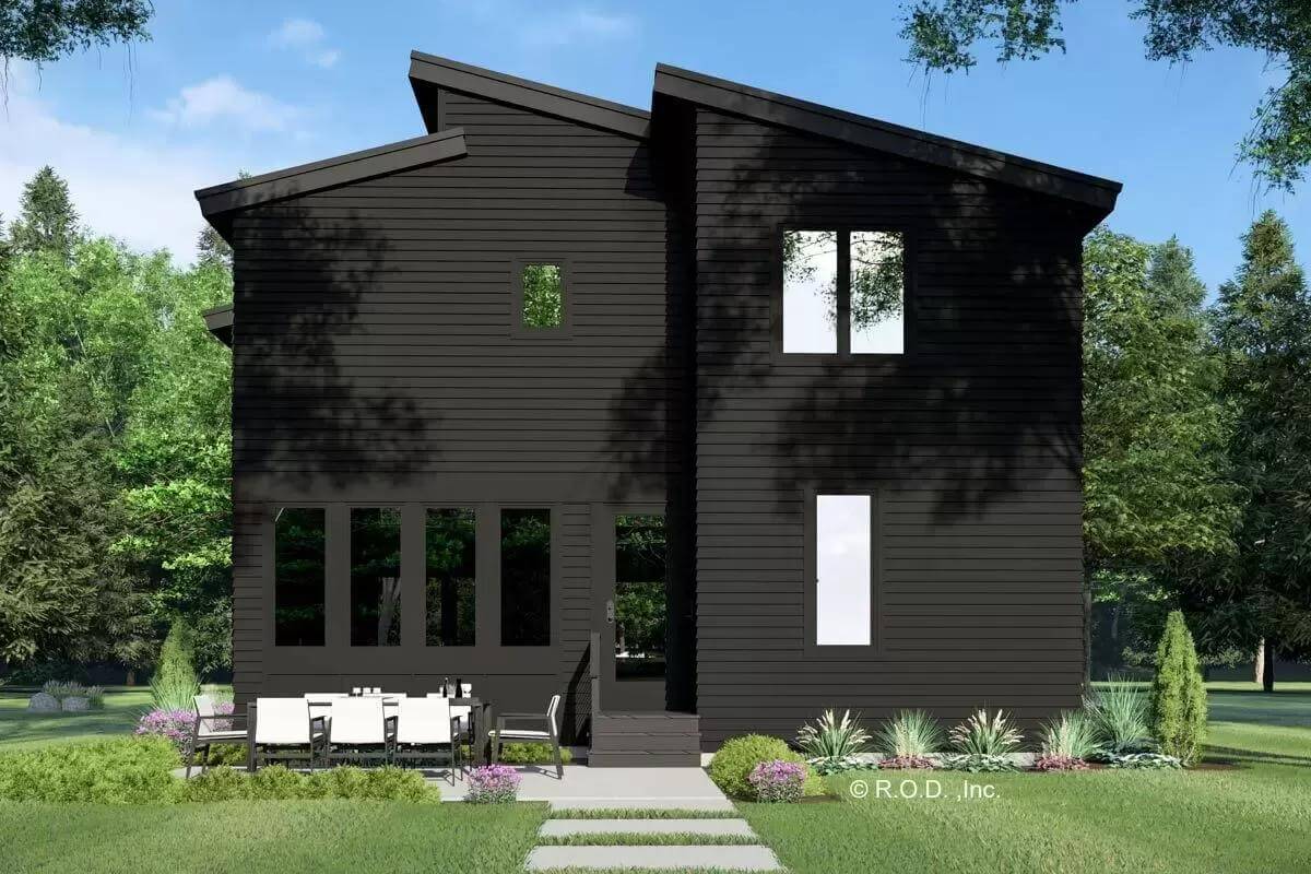 Rear view with sleek windows and an open patio.