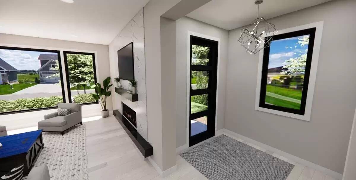Foyer with a glazed front door and a chrome pendant.