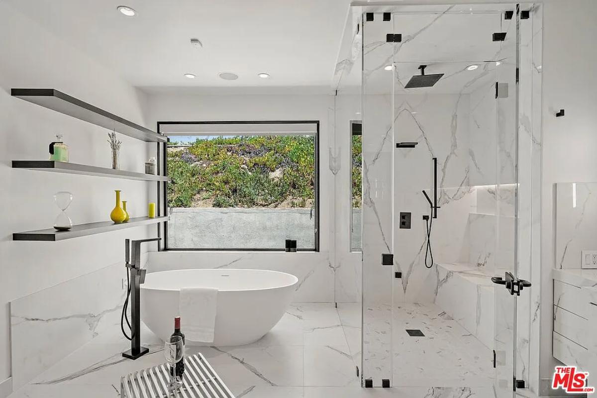 Bathroom with a soaking tub and a walk-in shower.