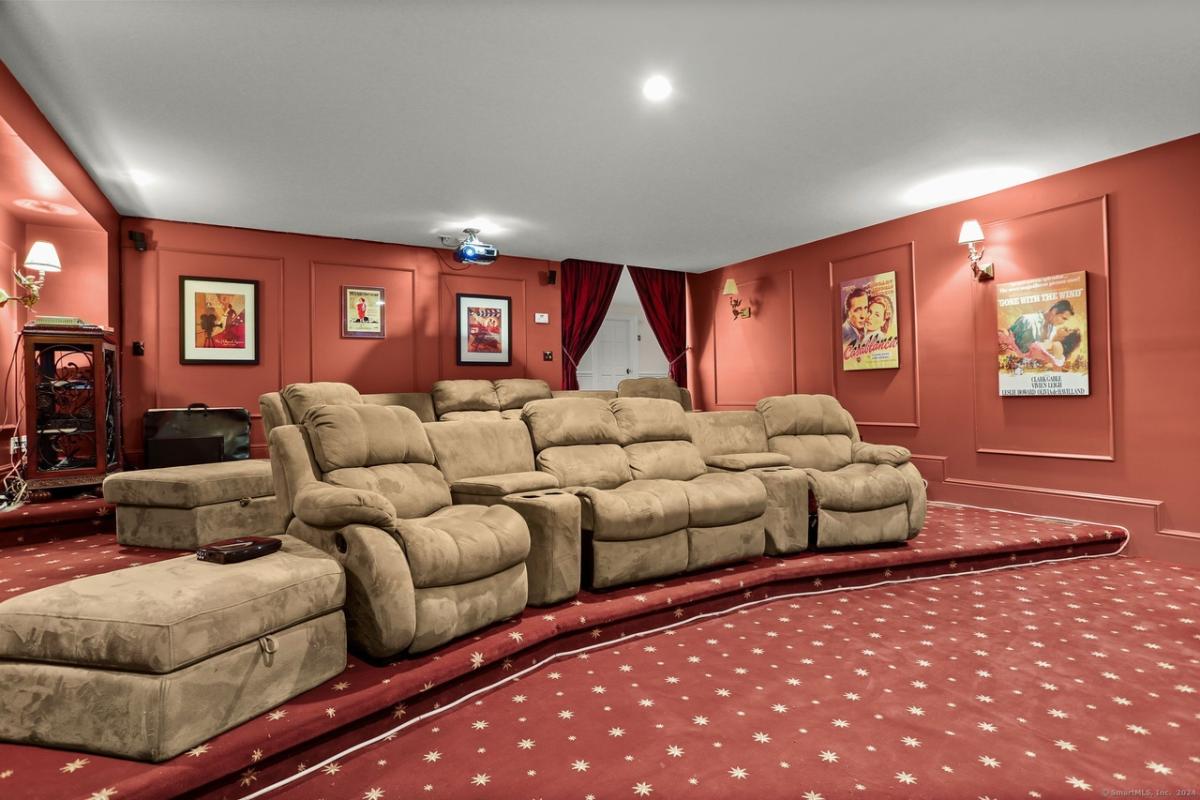 Home theater with reclining chairs.
