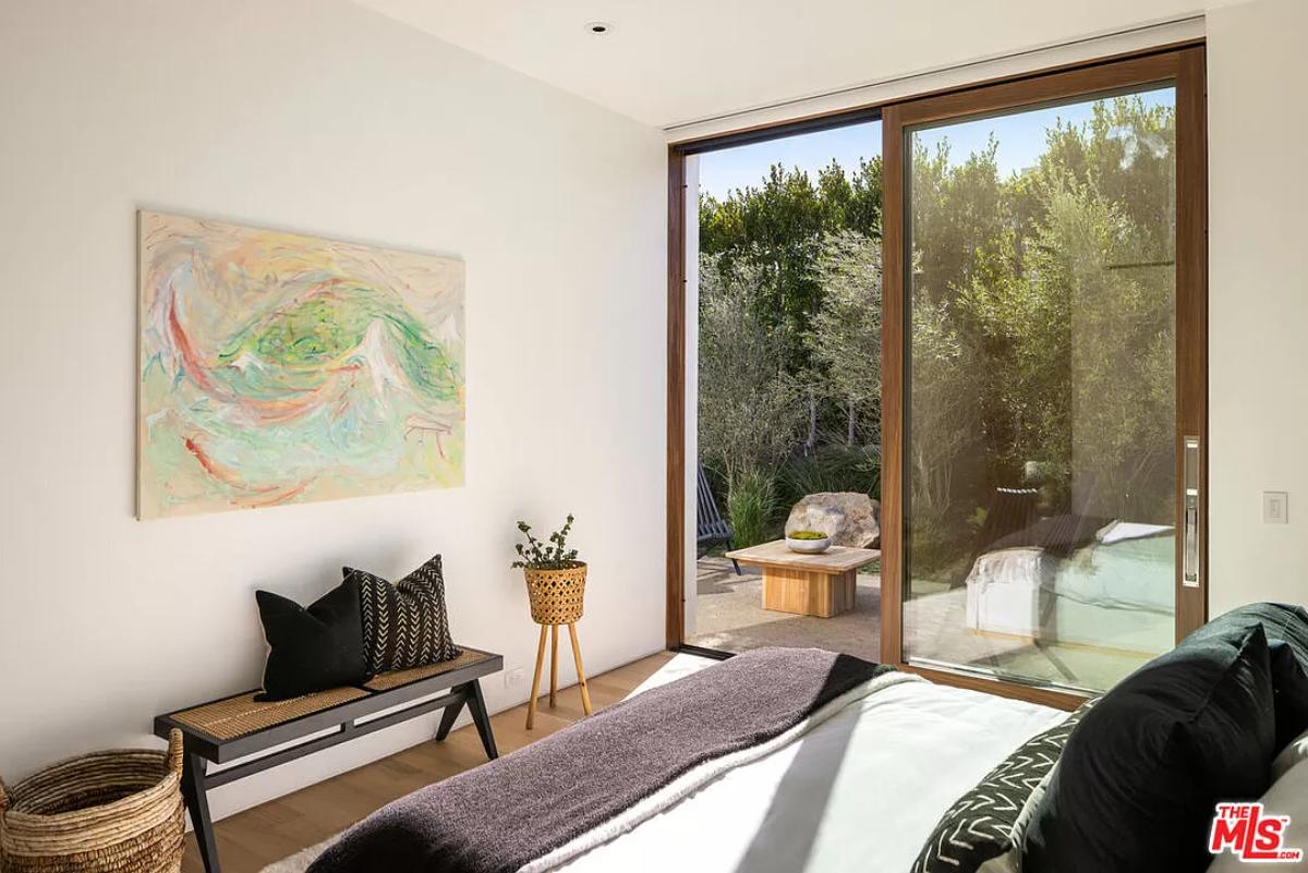 Bedroom with sliding glass doors.