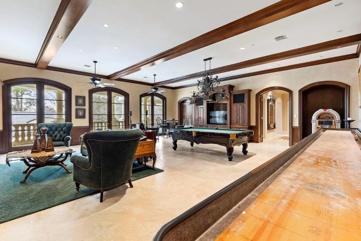 Recreational room with a billiards table.