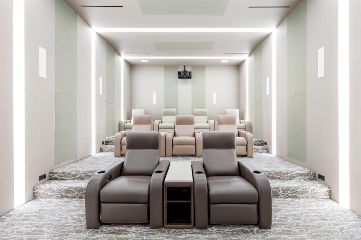 Home theater with reclining chairs.