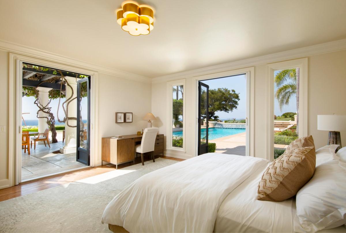 Bedroom with glass doors.