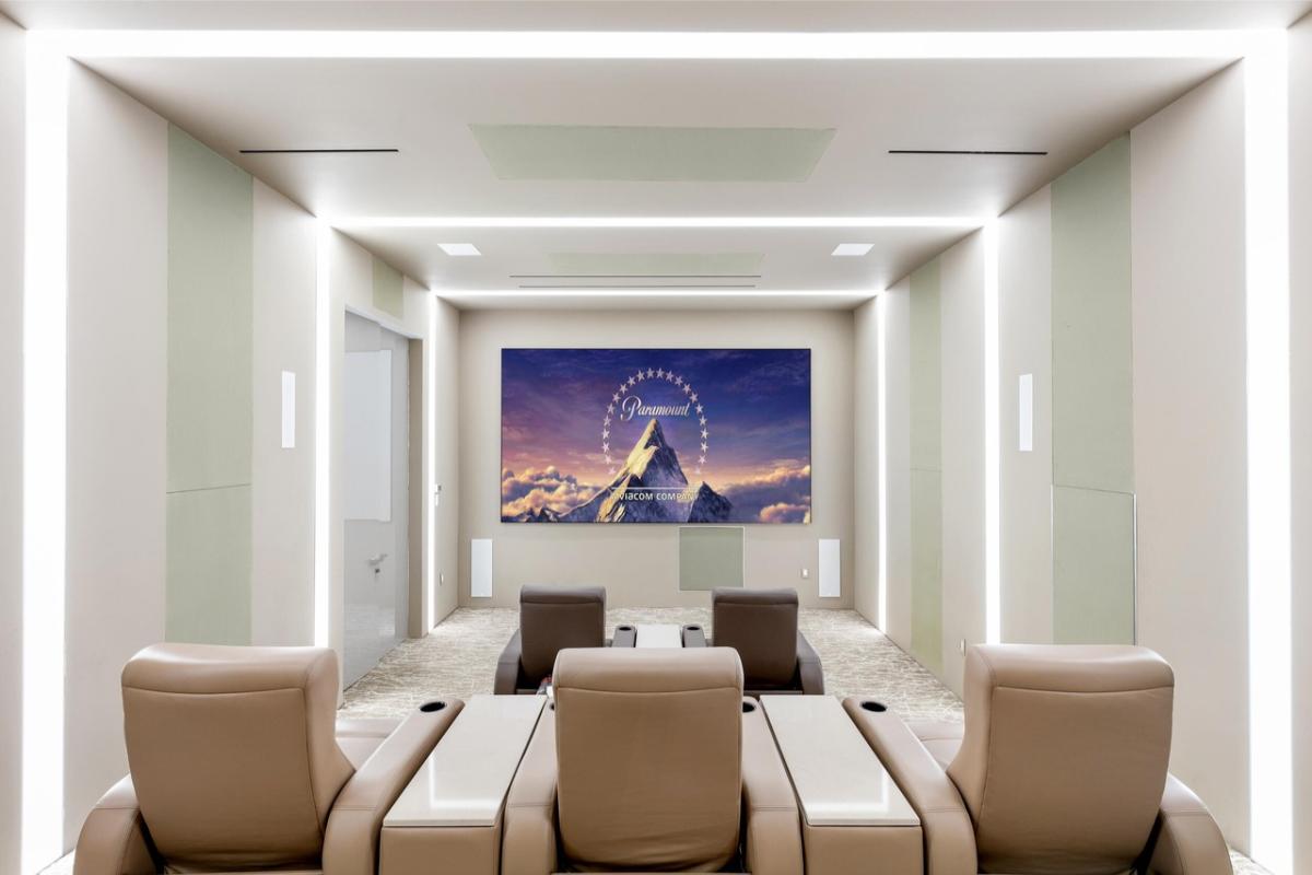 Home theater with reclining chairs.
