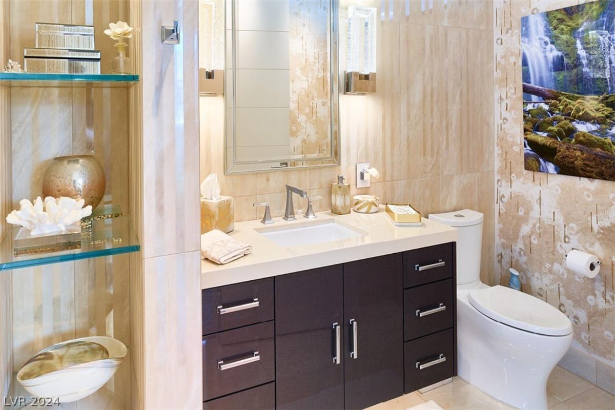 Bathroom with a sink and a toilet.