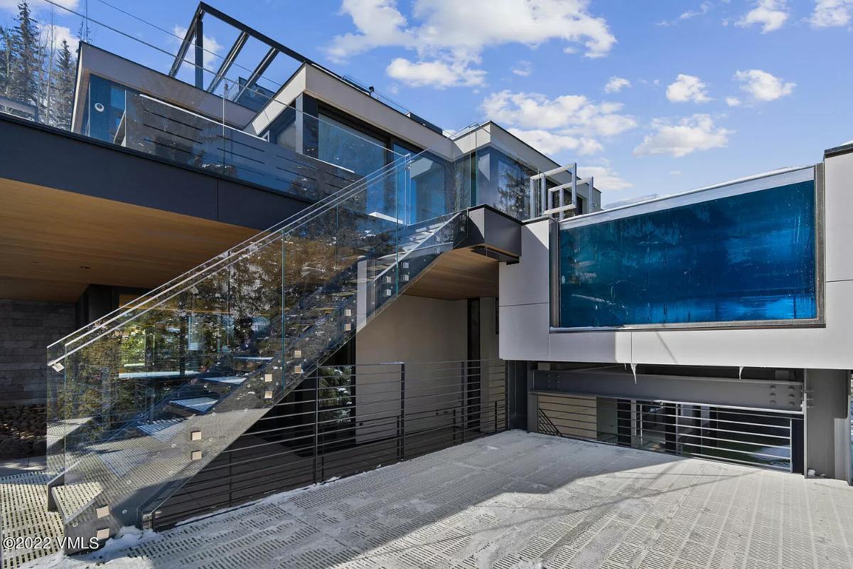 Stairs with glass railings.