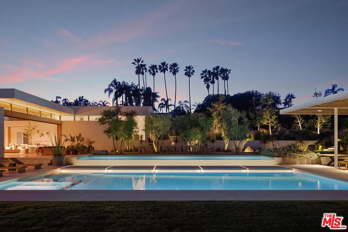 Pool with a dining area.