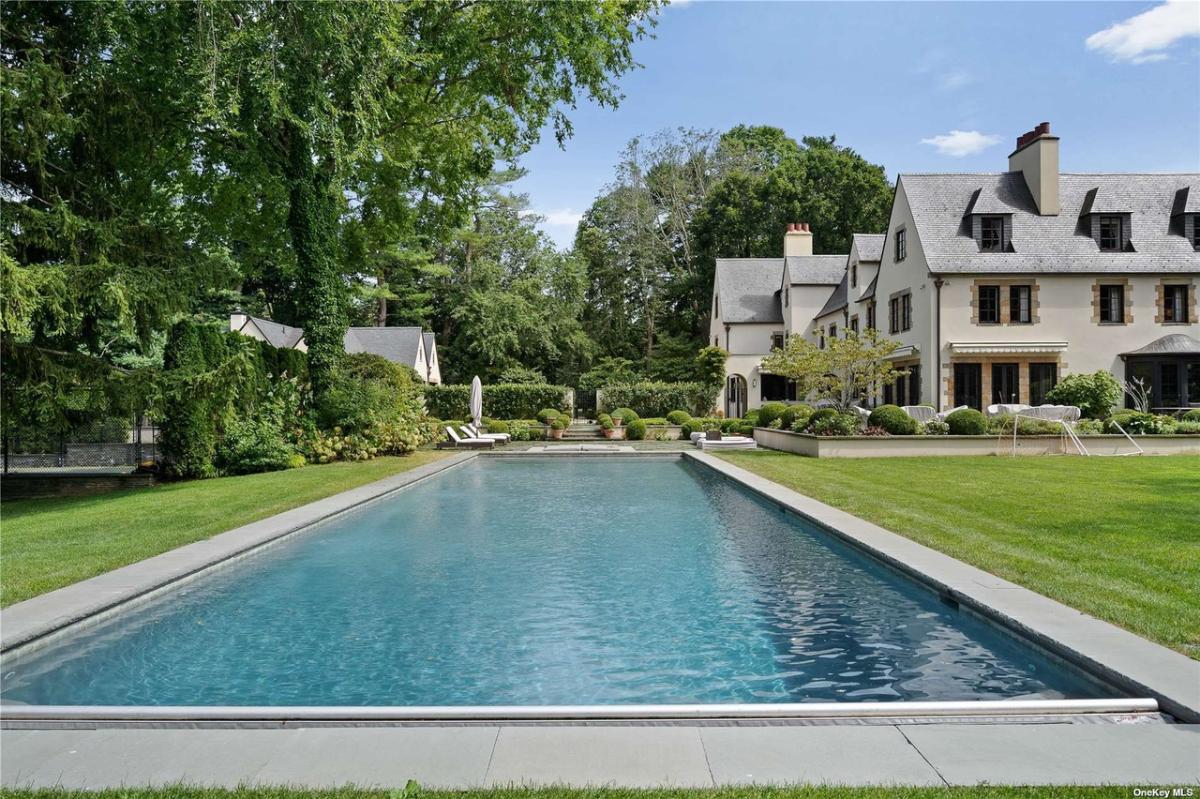 Pool with lounge chairs.