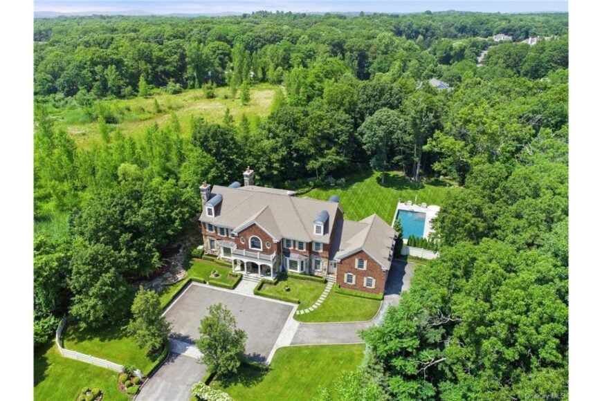 6-Bedroom Georgian-Style Three-Story Home with Loft and a 3-car Garage