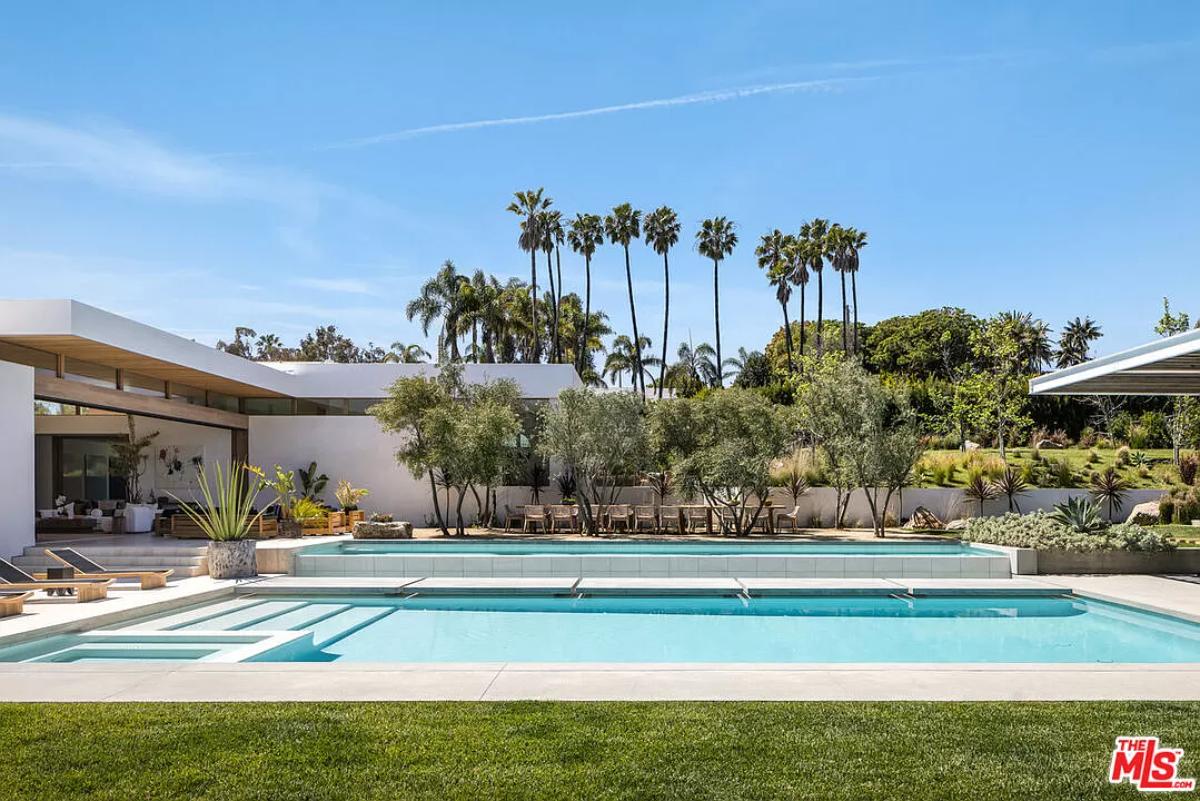Pool with lounge chairs.