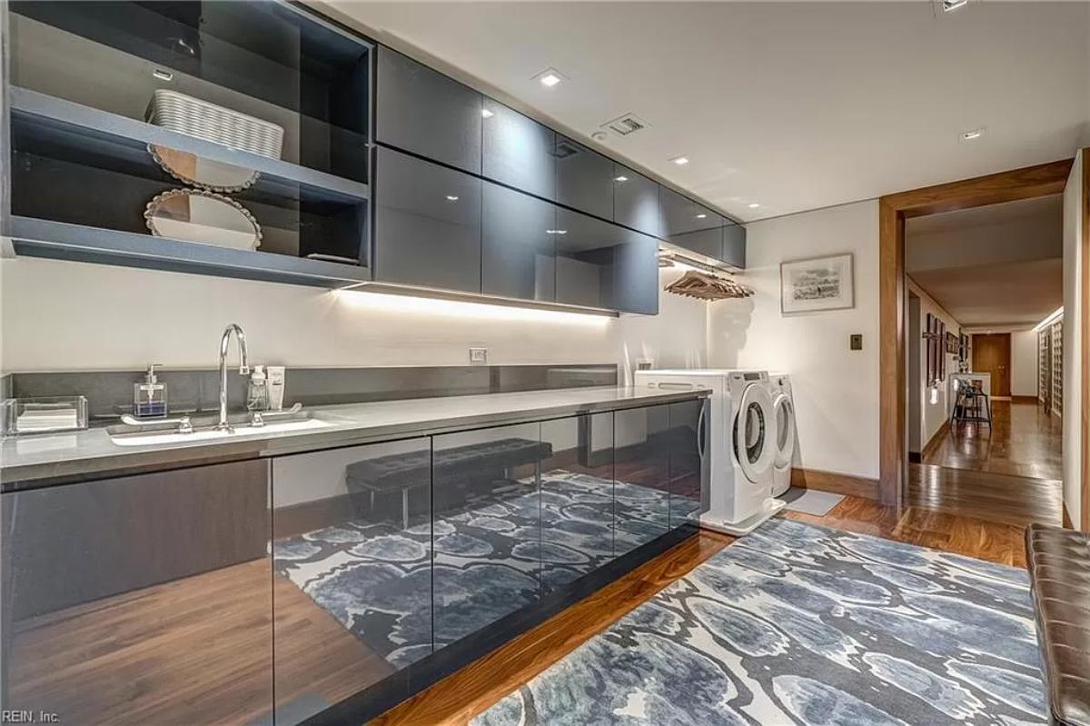 Laundry room with custom cabinetry.