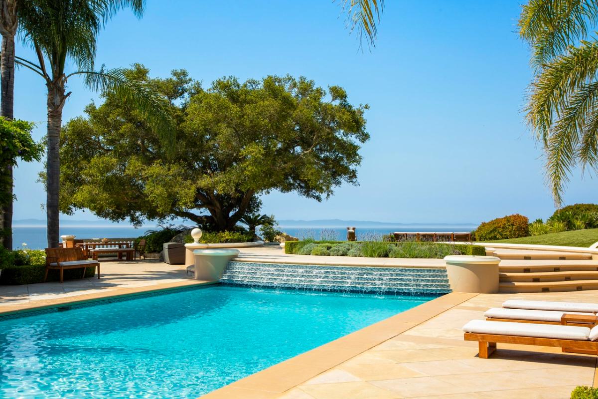 Pool with lounge chairs.