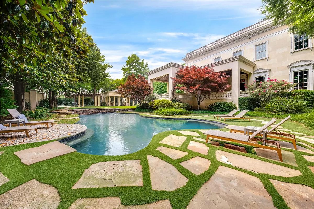 Pool with lounge chairs.
