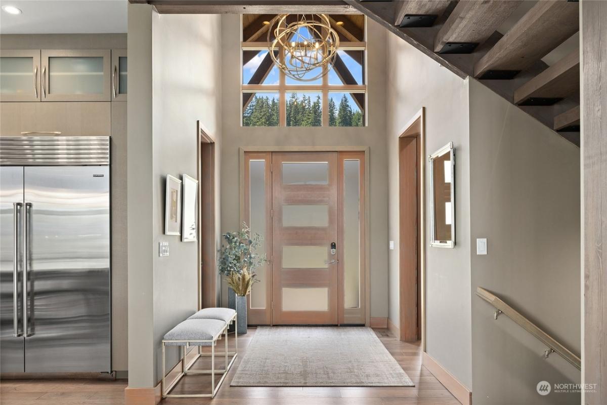 Foyer with hardwood flooring.
