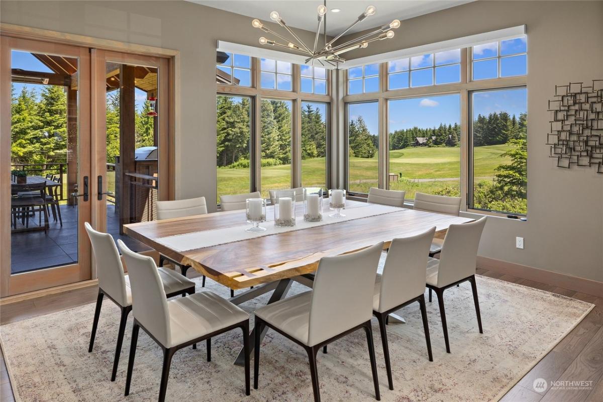 Dining room with a large wood table.