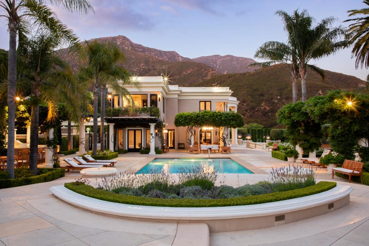 Pool with lounge chairs.