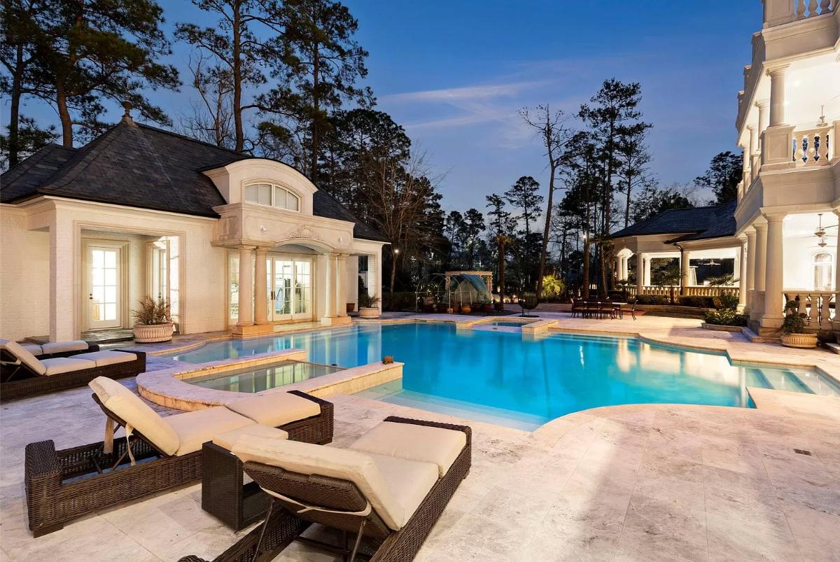 Pool with lounge chairs.
